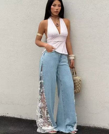 Jeans acampanados con abertura floral